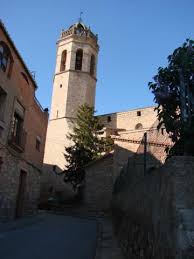 Fontanero Els Prats de Rei mostrando una calle empedrada típica con casas de piedra y un ambiente tranquilo